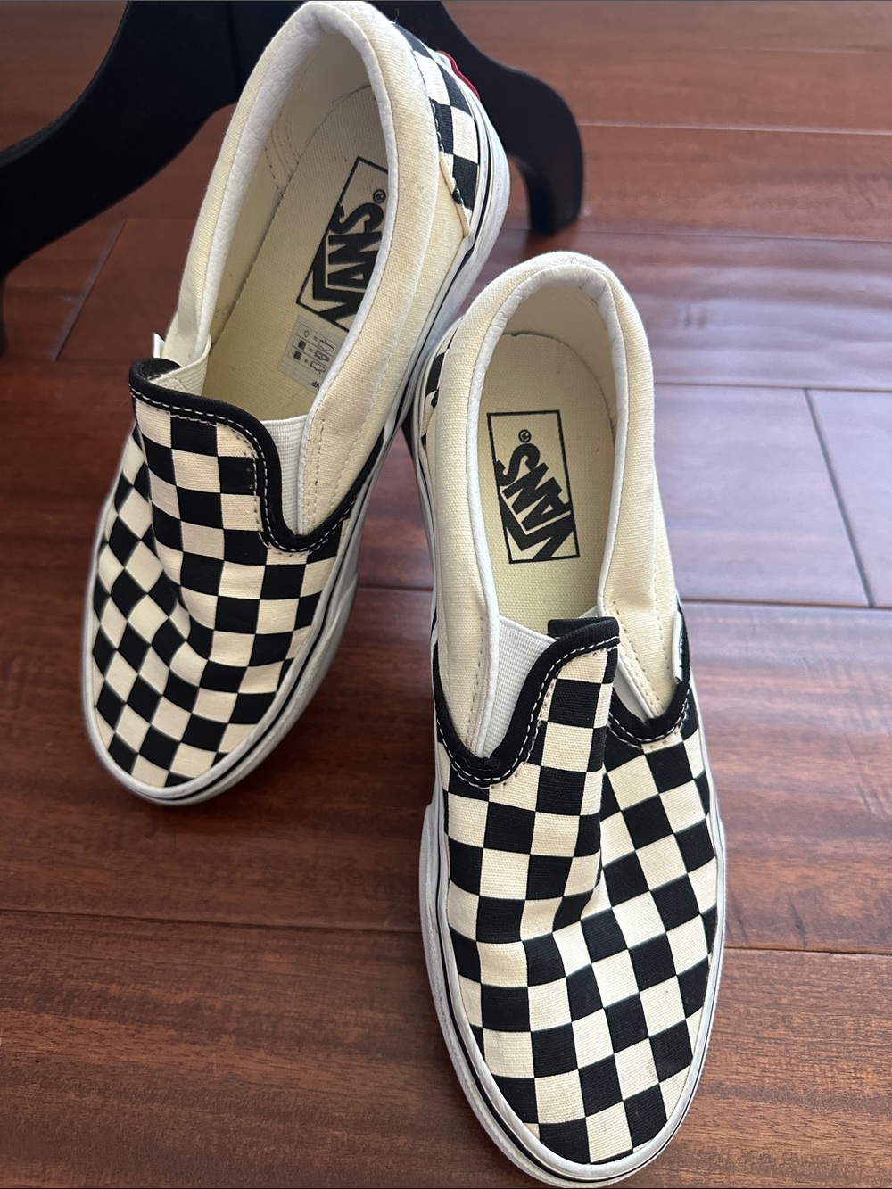 Vans Black & White Checkerboard Slip-On Sneakers